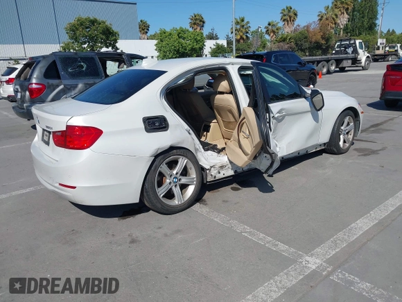 2014 BMW 3 Series 320i with VIN WBA3B1G50ENN90657, listed as a IAAI auction lot 42304612 with 129,377 mi miles and . Bid and sale history available at DreamBid. Image 4.