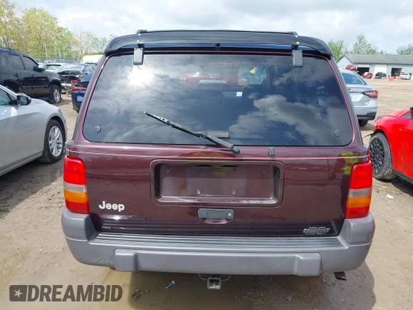 1997 Jeep Grand Cherokee Laredo with VIN 1J4GZ58S4VC702040, listed as a IAAI auction lot 42165536 with 121,803 mi miles and . Bid and sale history available at DreamBid. Image 17.