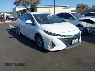 2022 Toyota Prius LE z VIN JTDKAMFP9N3201600, wystawiony jako IAAI lot #42518322 z przebiegiem 65 887 mil mil oraz . Historia ofert i sprzedaży dostępna na DreamBid. Obrazek 1.