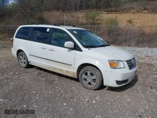 2010 Dodge Grand Caravan SXT with VIN 2D4RN5D12AR120322, listed as a IAAI auction lot 41876293 with 1 mi miles. Bid and sale history available at carsss.com. Image 1.