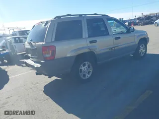 1999 Jeep Grand Cherokee Laredo with VIN 1J4GW58S4XC787702, listed as a IAAI auction lot 41663680 with 177,256 mi miles. Bid and sale history available at carsss.com. Image 4.