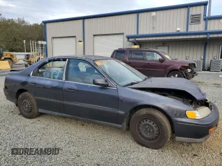1995 Honda Accord LX with VIN 1HGCD5630SA032204, listed as a Copart auction lot 79454934 with 52,291 mi miles and Salvage Title. Bid and sale history available at DreamBid. Image 4.