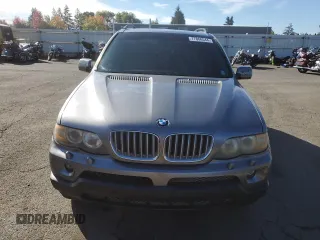 2005 BMW X5 4.4i with VIN 5UXFB53575LV16692, listed as a Copart auction lot 77866544 with 153,963 mi miles and Clean Title. Bid and sale history available at carsss.com. Image 5.