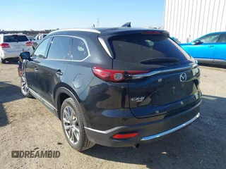 2018 Mazda CX-9 Signature with VIN JM3TCBEY2J0207786, listed as a IAAI auction lot 41478330 with 99,311 mi miles and . Bid and sale history available at DreamBid. Image 3.