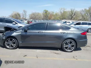 2019 Ford Fusion Titanium with VIN 3FA6P0D90KR109985, listed as a IAAI auction lot 41993329 with Not provided miles and . Bid and sale history available at DreamBid. Image 14.