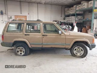 1999 Jeep Cherokee Sport with VIN 1J4FF68S0XL506805, listed as a IAAI auction lot 42663325 with 317,008 mi miles and . Bid and sale history available at DreamBid. Image 14.