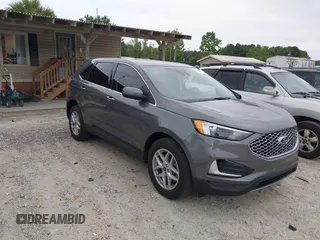 2024 Ford Edge SEL z VIN 2FMPK4J9XRBB14513, wystawiony jako IAAI lot #42309449 z przebiegiem 18 670 mil mil oraz . Historia ofert i sprzedaży dostępna na DreamBid. Obrazek 1.