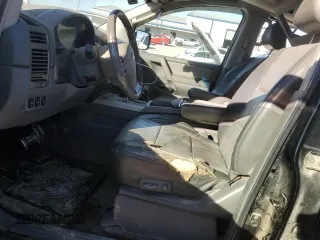 2005 Nissan Titan LE with VIN 1N6AA07B15N555054, listed as a Copart auction lot 42713855 with 213,169 mi miles and Salvage Title. Bid and sale history available at carsss.com. Image 7.