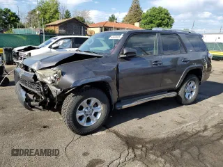 2014 Toyota 4Runner Limited with VIN JTEBU5JRXE5167009, listed as a Copart auction lot 63928025 with 221,864 mi miles and Salvage title. Bid and sale history available at DreamBid. Image 1.