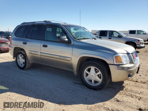 2003 GMC Envoy SLE with VIN 1GKDS13S832159909, listed as a Copart auction lot 73154194 with 212,643 mi miles and Clean Title. Bid and sale history available at DreamBid. Image 4.