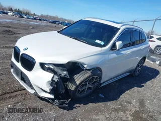 2019 BMW X1 xDrive28i with VIN WBXHT3C58K5N05523, listed as a IAAI auction lot 41752675 with 63,861 mi miles. Bid and sale history available at carsss.com. Image 2.