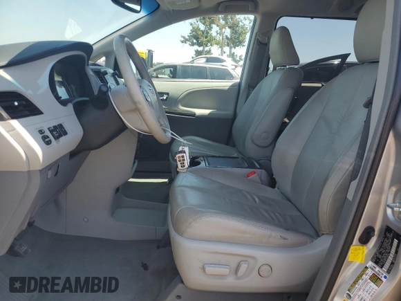 2012 Toyota Sienna XLE AAS with VIN 5TDYK3DC1CS204598, listed as a Copart auction lot 62293015 with 76,108 mi miles and Salvage title. Bid and sale history available at DreamBid. Image 7.