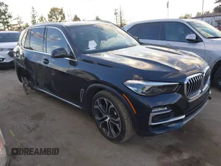2021 BMW X5 xDrive40i with VIN 5UXCR6C08M9D76272, listed as a IAAI auction lot 41219782 with 56,599 mi miles and . Bid and sale history available at DreamBid. Image 1.
