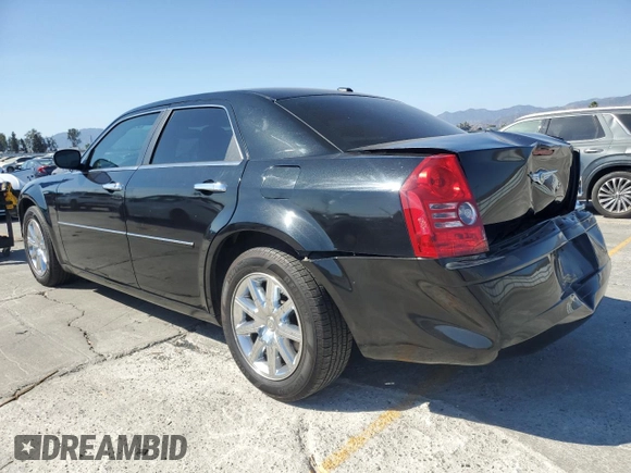 2009 Chrysler 300 Limited with VIN 2C3KA33V09H578112, listed as a Copart auction lot 59504765 with 170,928 mi miles and Salvage title. Bid and sale history available at DreamBid. Image 2.