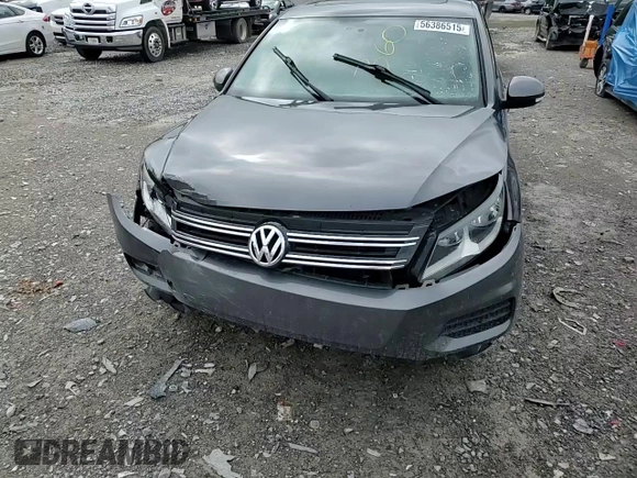 2013 Volkswagen Tiguan S z VIN WVGAV3AX6DW597379, wystawiony jako Copart lot #56386515 z przebiegiem 100 415 mil mil oraz Czysty tytuł • Clean title. Historia ofert i sprzedaży dostępna na DreamBid. Obrazek 15.