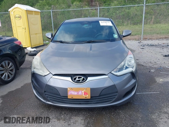 2013 Hyundai Veloster w/Black Int with VIN KMHTC6AD6DU169765, listed as a IAAI auction lot 41928516 with 130,708 mi miles and . Bid and sale history available at DreamBid. Image 12.