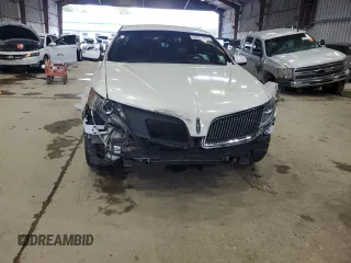 2013 Lincoln MKS z VIN 1LNHL9DK4DG613144, wystawiony jako Copart lot #54354625 z przebiegiem 104 211 mil mil oraz Szkoda całkowita • Salvage title. Historia ofert i sprzedaży dostępna na DreamBid. Obrazek 5.