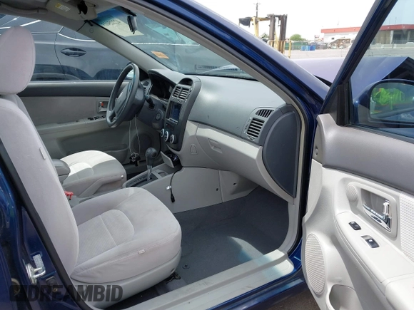 2007 Kia Spectra EX z VIN KNAFE122775468060, wystawiony jako IAAI lot #42225413 z przebiegiem 124 306 mil mil oraz . Historia ofert i sprzedaży dostępna na DreamBid. Obrazek 5.