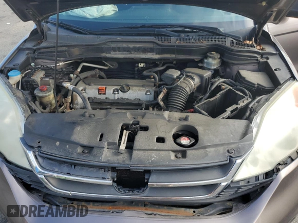 2011 Honda CR-V SE z VIN 5J6RE4H42BL000939, wystawiony jako Copart lot #57053725 z przebiegiem 172 865 mil mil oraz Szkoda całkowita • Salvage title. Historia ofert i sprzedaży dostępna na DreamBid. Obrazek 12.