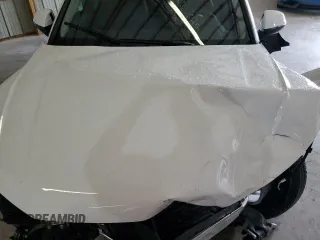2025 Audi Q5 Premium with VIN WA1ABAFY5S2043719, listed as a Copart auction lot 57621145 with Not provided miles and Salvage title. Bid and sale history available at DreamBid. Image 12.