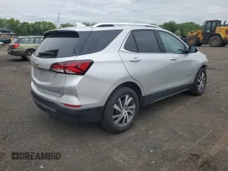 2022 Chevrolet Equinox Premier z VIN 2GNAXXEV2N6125522, wystawiony jako Copart lot #57953625 z przebiegiem 91 865 mil mil oraz Czysty tytuł • Clean title. Historia ofert i sprzedaży dostępna na DreamBid. Obrazek 3.