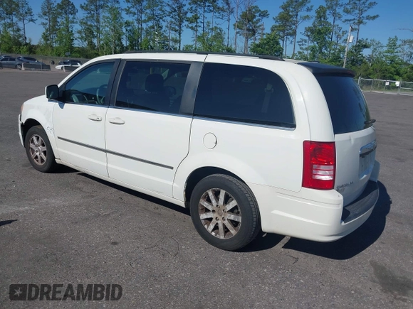 2010 Chrysler Town & Country Touring with VIN 2A4RR5D11AR493086, listed as a IAAI auction lot 42012604 with 154,204 mi miles and . Bid and sale history available at DreamBid. Image 3.