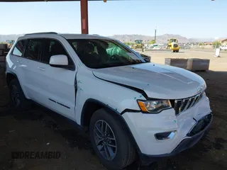 2019 Jeep Grand Cherokee Laredo E with VIN 1C4RJEAG4KC548467, listed as a IAAI auction lot 42463613 with 98,061 mi miles and . Bid and sale history available at DreamBid. Image 1.
