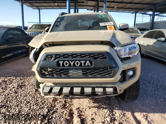 2019 Toyota Tacoma SR z VIN 5TFCZ5AN8KX171793, wystawiony jako Copart lot #57907015 z przebiegiem 96 925 mil mil oraz Szkoda całkowita • Salvage title. Historia ofert i sprzedaży dostępna na DreamBid. Obrazek 5.