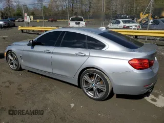 2016 BMW 4 Series 428i with VIN WBA4A9C58GGL89883, listed as a Copart auction lot 52114415 with 132,796 mi miles and Salvage Title. Bid and sale history available at carsss.com. Image 2.