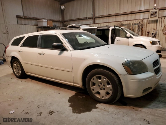 2006 Dodge Magnum with VIN 2D4FV47T96H381423, listed as a Copart auction lot 41597095 with NaN miles and Salvage Title. Bid and sale history available at carsss.com. Image 4.