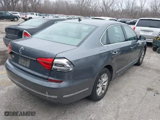 2016 Volkswagen Passat 1.8T S with VIN 1VWAS7A31GC052520, listed as a IAAI auction lot 41547408 with 129,730 mi miles. Bid and sale history available at carsss.com. Image 4.