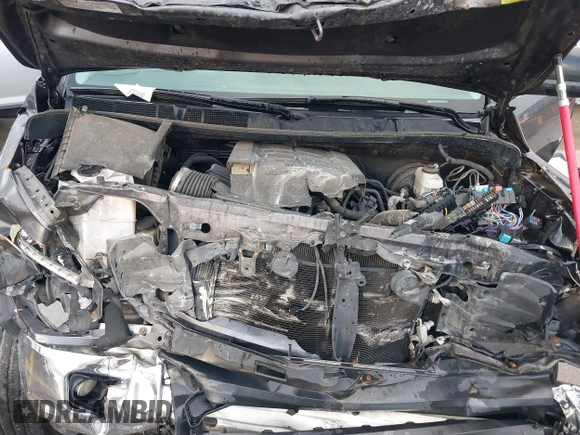 2014 Toyota Tundra SR5 z VIN 5TFEM5F16EX082421, wystawiony jako IAAI lot #40735426 z przebiegiem 173 005 mil mil oraz . Historia ofert i sprzedaży dostępna na DreamBid. Obrazek 10.