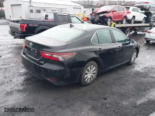 2021 Toyota Camry Hybrid LE with VIN 4T1C31AK9MU566159, listed as a IAAI auction lot 41734274 with 40,250 mi miles. Bid and sale history available at carsss.com. Image 4.