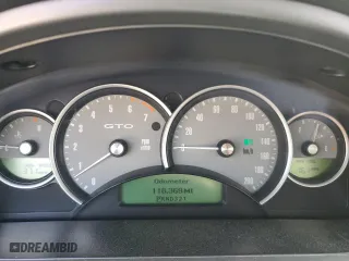 2004 Pontiac GTO with VIN 6G2VX12G74L315052, listed as a Copart auction lot 42952005 with 118,369 mi miles and Salvage Title. Bid and sale history available at carsss.com. Image 9.
