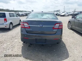 2015 Ford Taurus SEL with VIN 1FAHP2E81FG122378, listed as a IAAI auction lot 42081001 with 159,853 mi miles and . Bid and sale history available at carsss.com. Image 17.