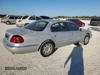 2001 Lincoln Continental with VIN 1LNHM97V01Y667338, listed as a Copart auction lot 82692274 with 126,875 mi miles and Clean Title. Bid and sale history available at carsss.com. Image 3.