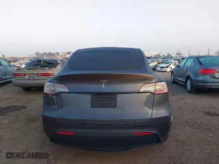 2021 Tesla Model Y Standard Range with VIN 5YJYGDED4MF121963, listed as a IAAI auction lot 41490477 with 41,941 mi miles. Bid and sale history available at carsss.com. Image 16.