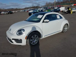 2019 Volkswagen Beetle SE with VIN 3VWJD7AT6KM713525, listed as a IAAI auction lot 41508195 with 73,360 mi miles. Bid and sale history available at carsss.com. Image 17.