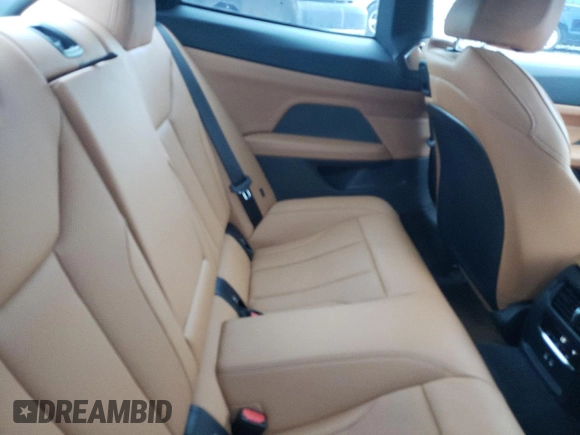 2023 BMW 4 Series 430i xDrive z VIN WBA73AP06PCM49576, wystawiony jako Copart lot #54589993 z przebiegiem 1 742 mil mil oraz . Historia ofert i sprzedaży dostępna na DreamBid. Obrazek 10.
