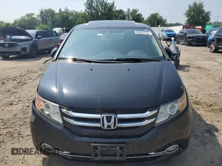 2014 Honda Odyssey Touring with VIN 5FNRL5H91EB015162, listed as a Copart auction lot 60643135 with 176,898 mi miles and Salvage title. Bid and sale history available at DreamBid. Image 5.