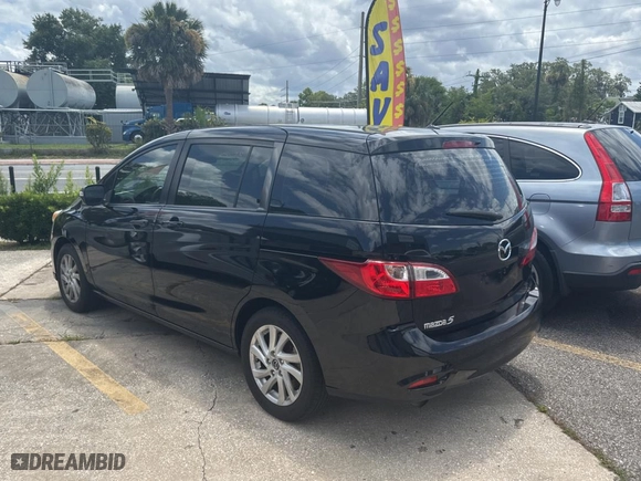 2015 Mazda Mazda5 Sport with VIN JM1CW2BLXF0182880, listed as a Copart auction lot 59904084 with 100,383 mi miles. Bid and sale history available at carsss.com. Image 3.