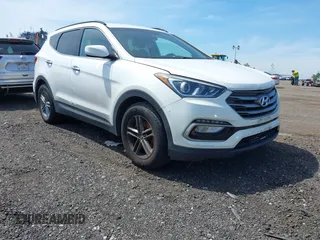 2017 Hyundai Santa Fe 2.4L z VIN 5XYZUDLBXHG410049, wystawiony jako IAAI lot #42252370 z przebiegiem 97 113 mil mil oraz . Historia ofert i sprzedaży dostępna na DreamBid. Obrazek 1.