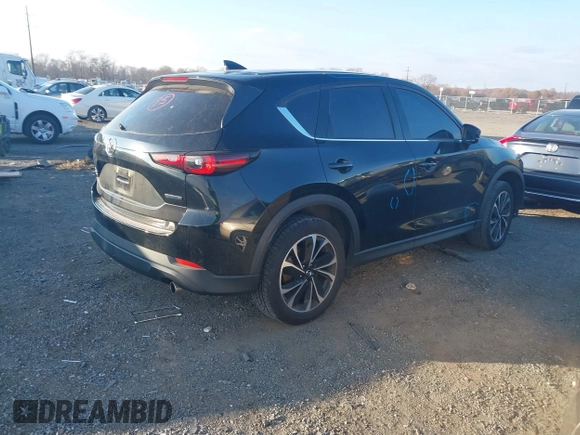 2022 Mazda CX-5 2.5 S Premium Package with VIN JM3KFBDM1N1537243, listed as a IAAI auction lot 40871911 with 77,725 mi miles. Bid and sale history available at carsss.com. Image 4.