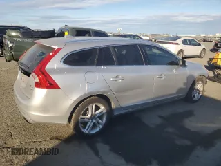 2015 Volvo V60 z VIN YV1612SB6F1211119, wystawiony jako Copart lot #77466004 z przebiegiem 144 388 mil mil oraz Szkoda całkowita • Salvage title. Historia ofert i sprzedaży dostępna na DreamBid. Obrazek 3.