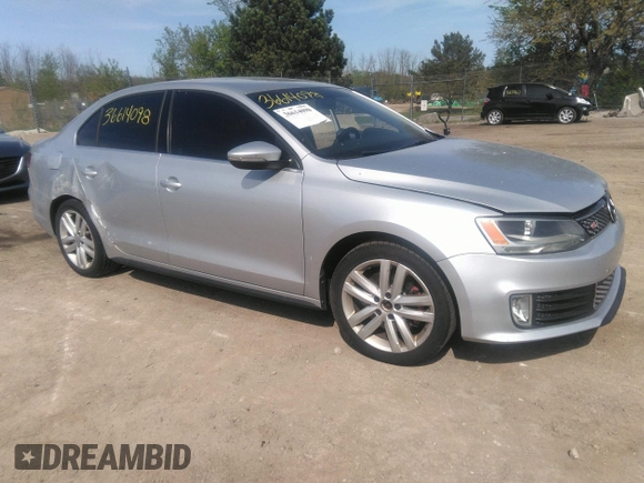2014 Volkswagen Jetta GLI Autobahn z VIN 3VW5S7AJ4EM396791, wystawiony jako IAAI lot #39648541 z przebiegiem 103 025 mil mil oraz . Historia ofert i sprzedaży dostępna na DreamBid. Obrazek 1.
