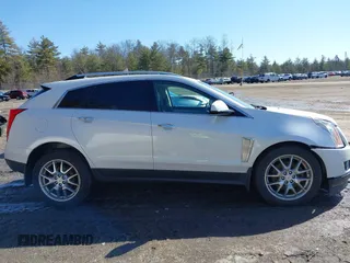 2014 Cadillac SRX Performance Collection with VIN 3GYFNFE30ES586713, listed as a IAAI auction lot 41791356 with 74,927 mi miles and . Bid and sale history available at DreamBid. Image 14.