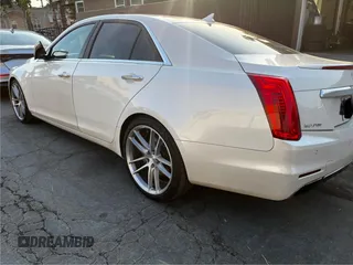 2014 Cadillac CTS Vsport Premium RWD z VIN 1G6AV5S87E0163180, wystawiony jako Copart lot #88171835 z przebiegiem 156 789 mil mil oraz Szkoda całkowita • Salvage title. Historia ofert i sprzedaży dostępna na DreamBid. Obrazek 3.
