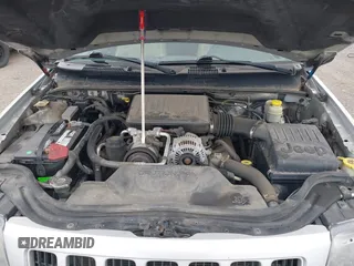 2004 Jeep Grand Cherokee Laredo with VIN 1J4GW48N14C434351, listed as a IAAI auction lot 41860077 with 152,404 mi miles and . Bid and sale history available at DreamBid. Image 10.