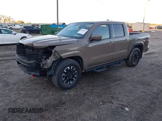 2022 Nissan Frontier SV z VIN 1N6ED1EJ3NN648912, wystawiony jako IAAI lot #40888927 z przebiegiem 59 633 mil mil oraz . Historia ofert i sprzedaży dostępna na DreamBid. Obrazek 2.