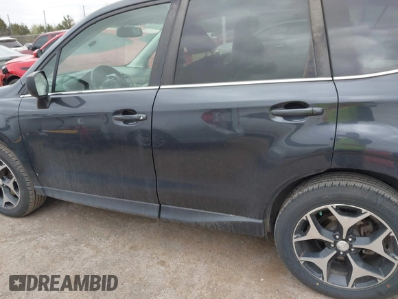 2015 Subaru Forester 2.0XT Premium with VIN JF2SJGDC1FH823888, listed as a IAAI auction lot 41829859 with 90,743 mi miles. Bid and sale history available at carsss.com. Image 15.
